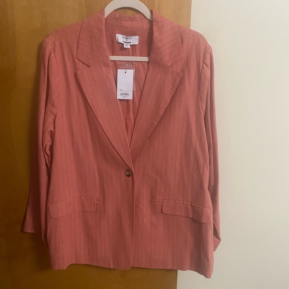 Dark Peach colored jacket. Brand new tags on it still.